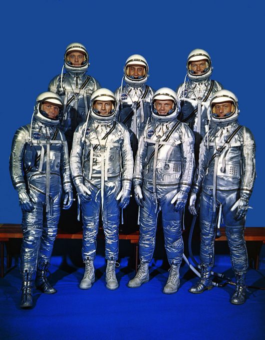 799px-original_7_astronauts_in_spacesuits_-_gpn-2000-001293