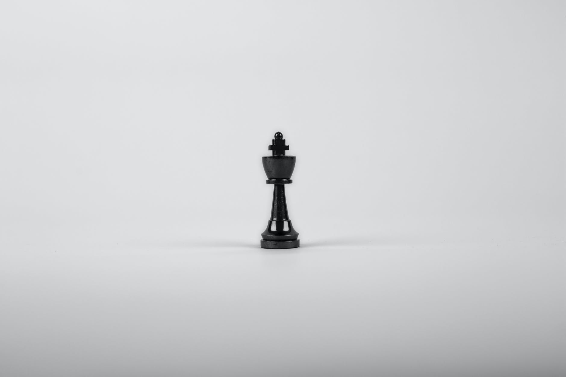 black wooden king chess piece